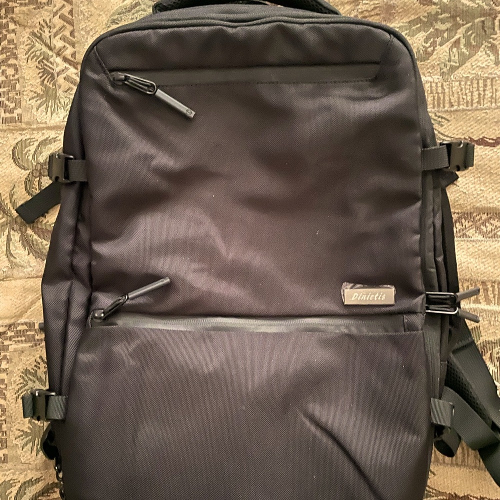 Large travel carry on backpack with suction section